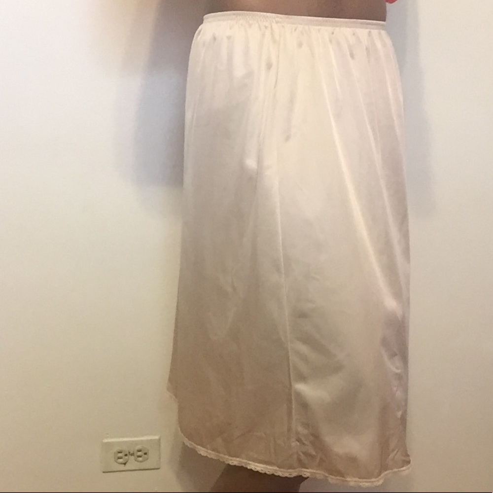 Cream slip with small lace trim.